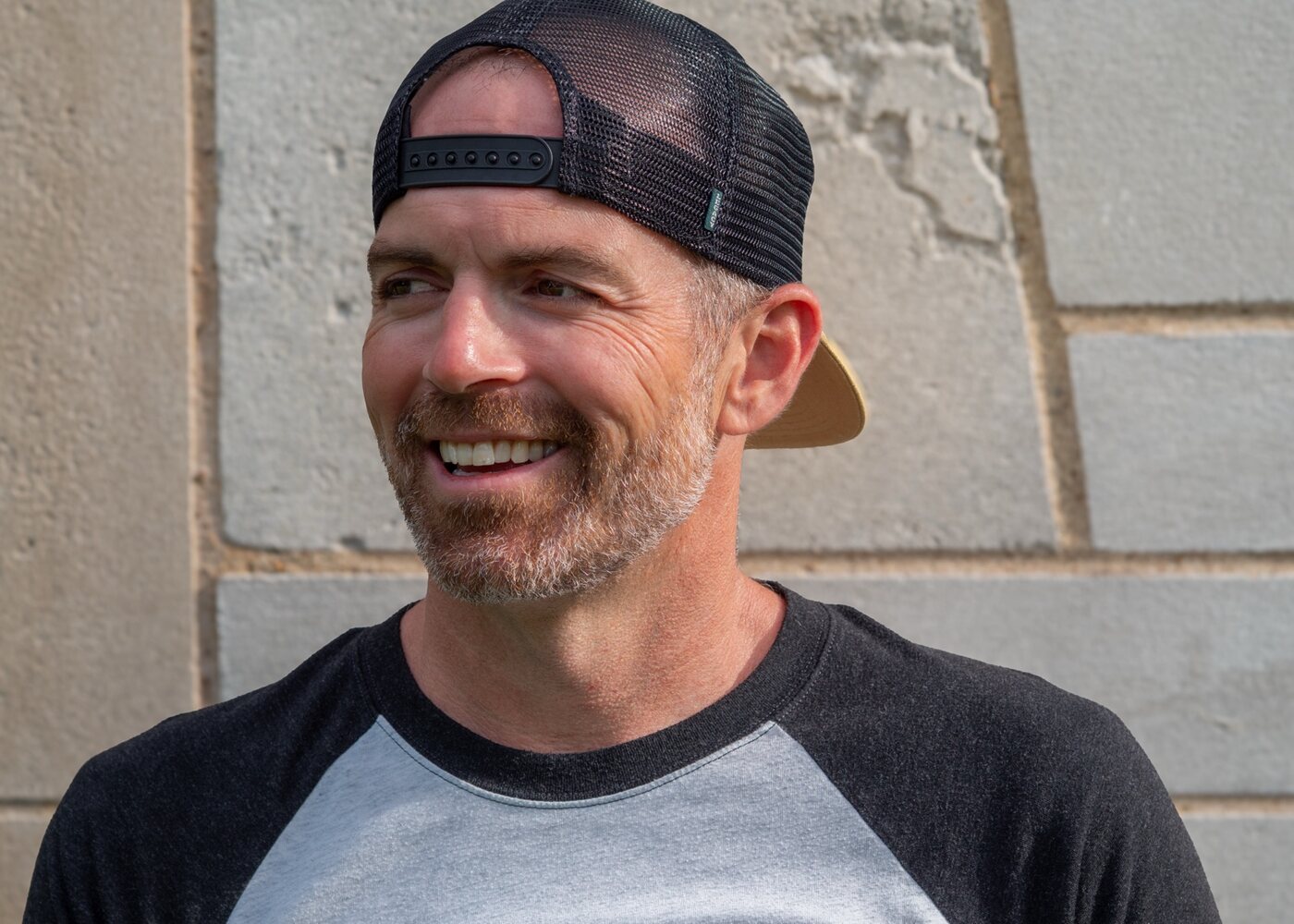 Luke Lindholm smiling outdoors